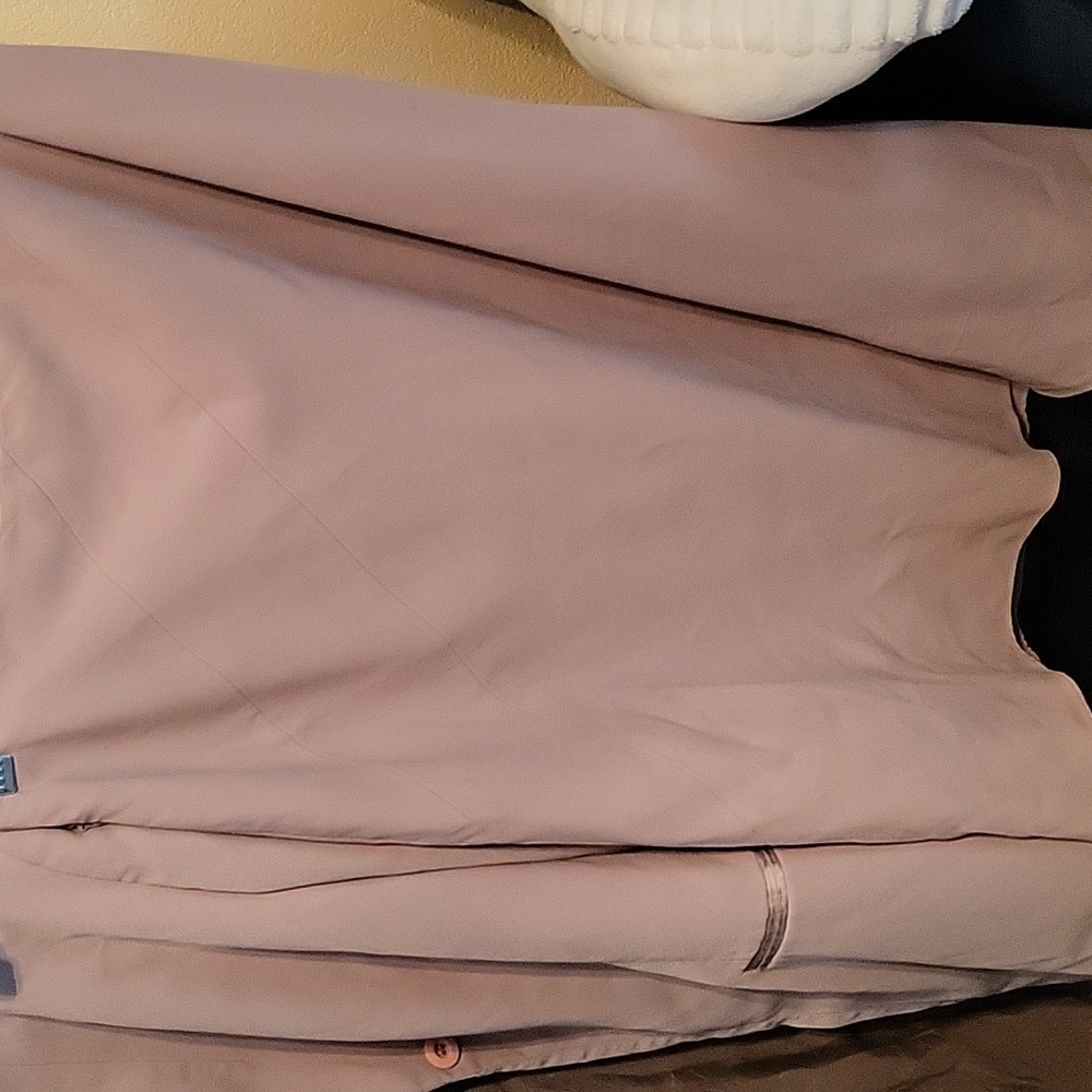 a beige suit